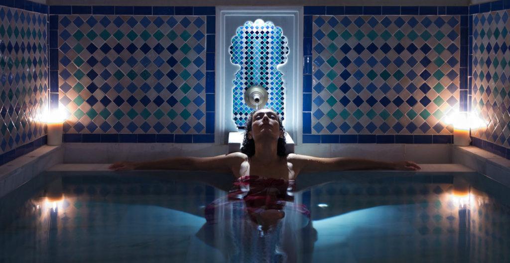 Woman inside a pool in Hammam-Al-Andalus-in-Malaga-city