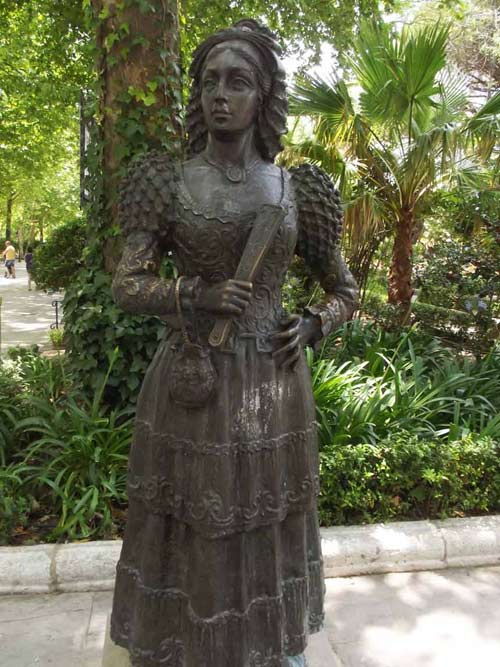 Beautifull esculpture of Dama Goyesca in Alameda Park, Malaga city